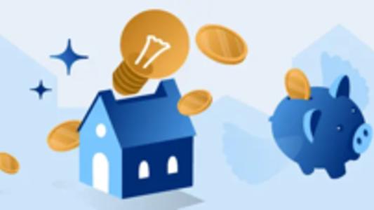 Energie sparen: Blaues Haus mit Sparschwein und Geldmünzen